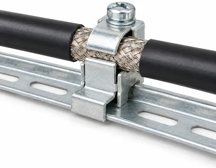 A screened cable with its braid clamped on an earthed rail